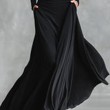Norika - Elegantné šaty s fluidnými záhybmi